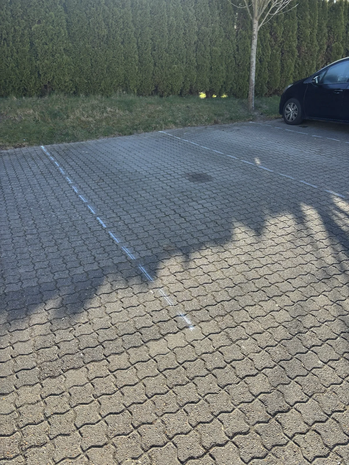 Belægningsarbejde på parkeringsplads